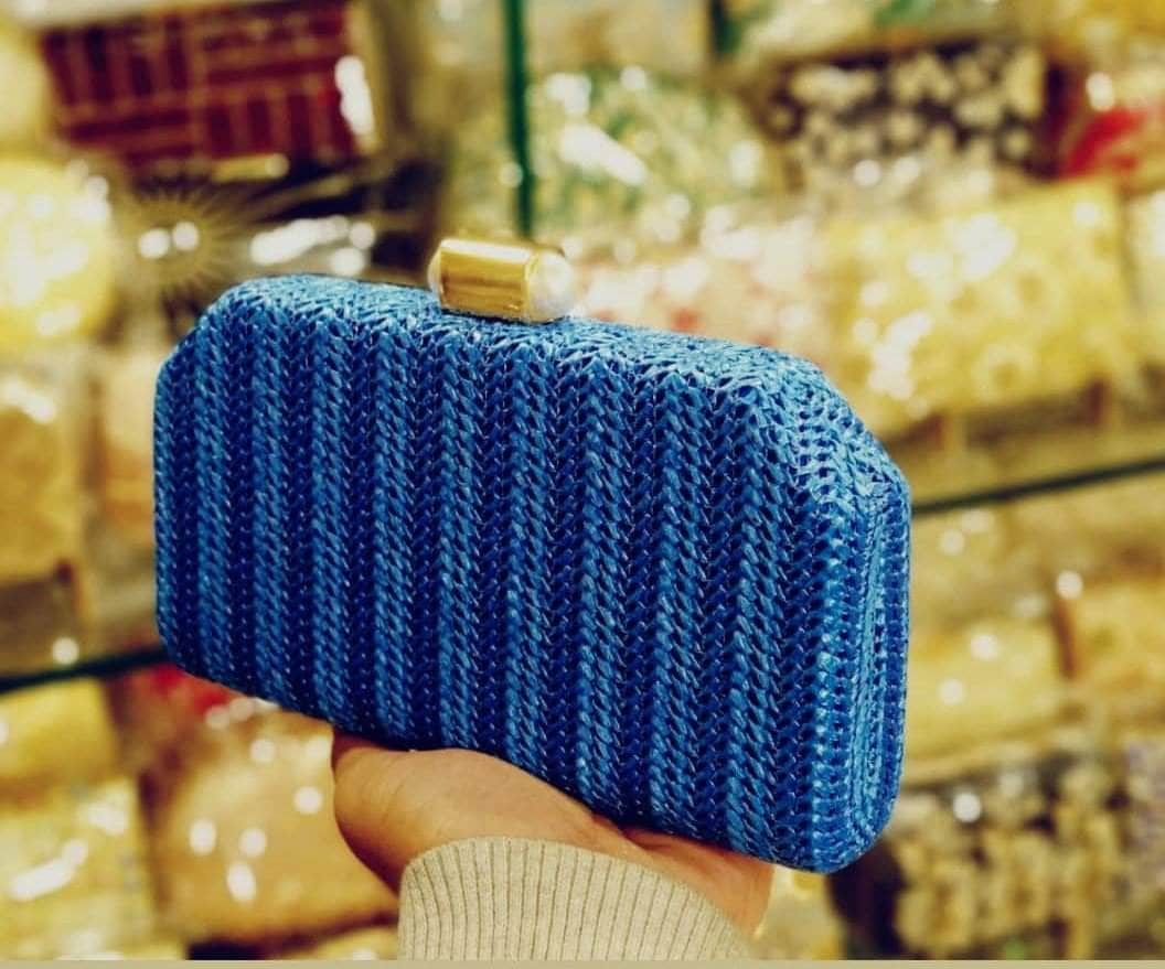 Blue designer store clutch bag