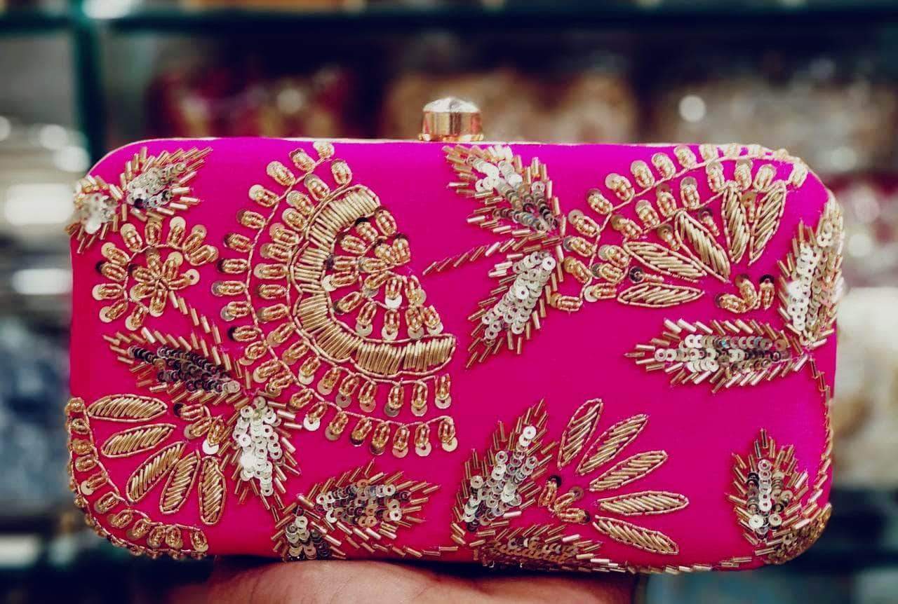 Pink designer clutch hot sale